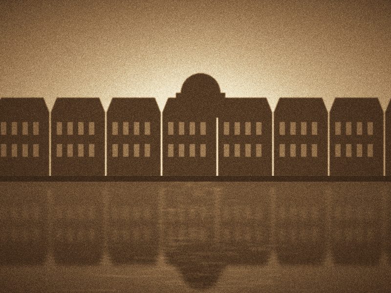 Façades classiques d'un quai bordelais se reflétant dans le fleuve